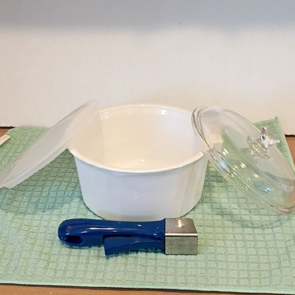 Elegant White Cookware with Blue Handle